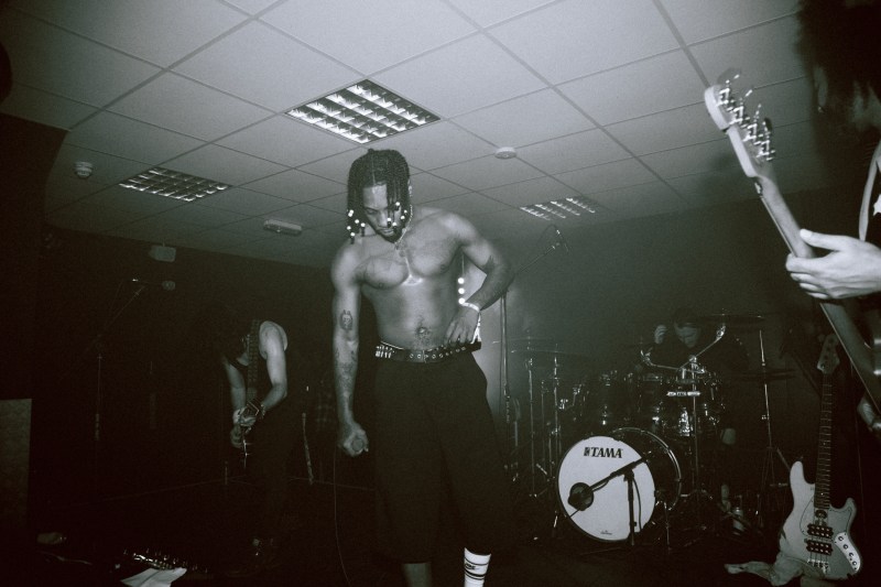 Native James 4 piece band performing on stage